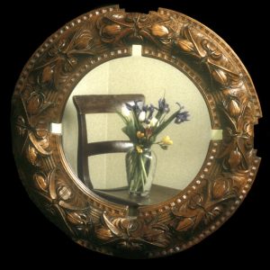 A design based on tulips grown in my Mother's garden. Beautiful and, I think, my most successful design. Mahogany and wax polished with an antique mirror glass