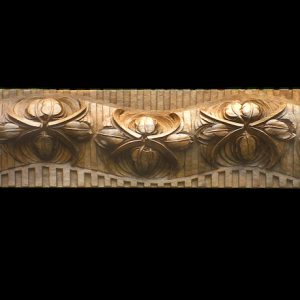 The tulip panel was a commission based on the mirror. Carved in walnut and wax polished